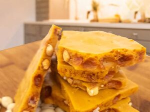 Candy by Grant - Our Peanut Brittle Side View Showing the air pockets and peanuts. Amazing! For Sale Online and Available Locally in Waukesha, WI. We may be biased, but we think this is the best peanut brittle.