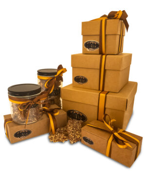 Candy by Grant Our Complete Milk Chocolate Pecan Toffee Line including 4oz, 8oz, and 1lb Regular Boxes, 8oz and 16oz Glass Jars, and 1lb, 2lb, and 5lb Decorative Boxes which are great for gifts!