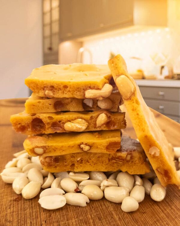 Candy by Grant - Our Peanut Brittle Side View Showing the air pockets and peanuts. Amazing! For Sale Online and Available Locally in Waukesha, WI. We may be biased, but we think this is the best peanut brittle.